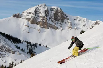 Person skiing down mountain in Jackson Hole, Wyoming.